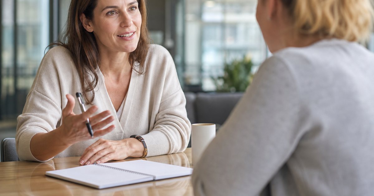 How should a coach set goals with a new client so the goals actually stick and get tracked?